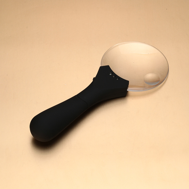 TH607 popular handheld magnifying glass with compass outdoor multi-function LED light reading magnifying glass.