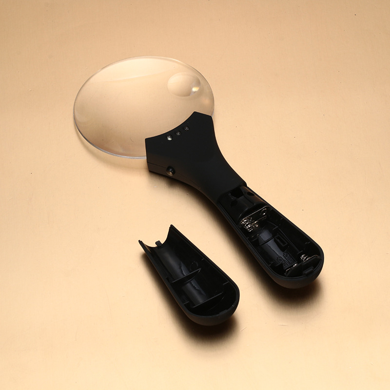 TH607 popular handheld magnifying glass with compass outdoor multi-function LED light reading magnifying glass.