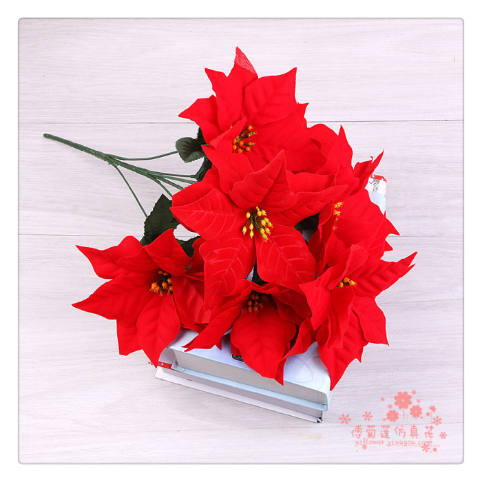 Christmas flower fake flower silk flower simulation of poinsettias red Christmas red festival display. Christmas flower fake flower silk flower simulation of poinsettias red Christmas red festival display.