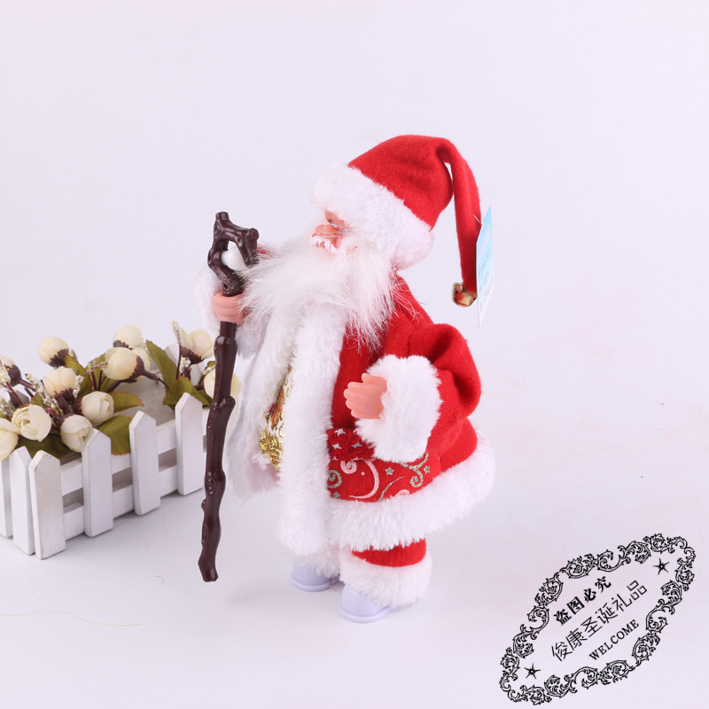 Santa Claus holds a walking stick as a Christmas ornament