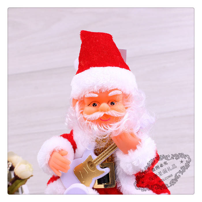 Christmas guitar Santa Claus electric music Santa Claus desktop presents a gift
