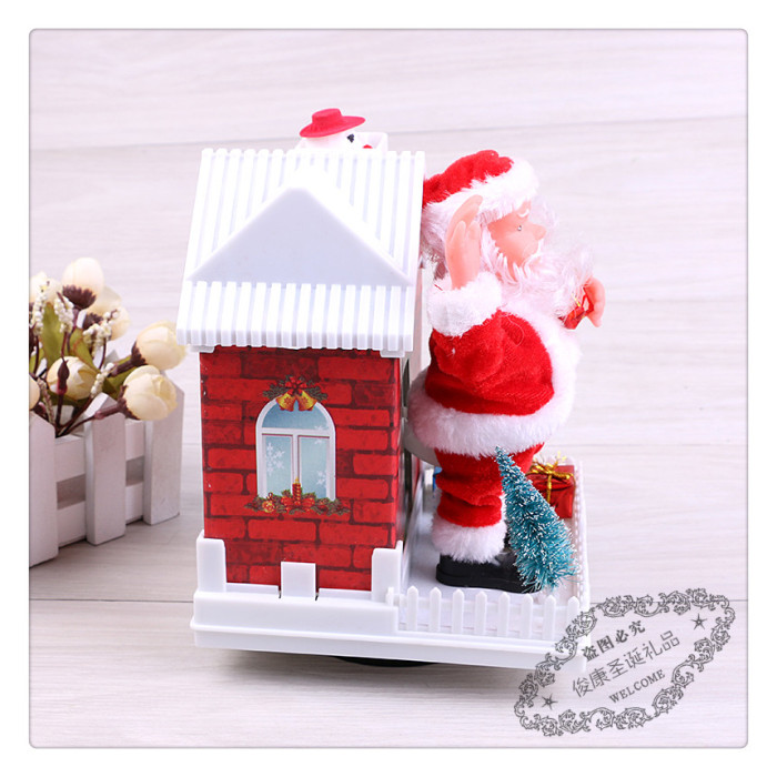 Christmas snow house electric music Santa Claus scene decorating the decorative tabletop presents