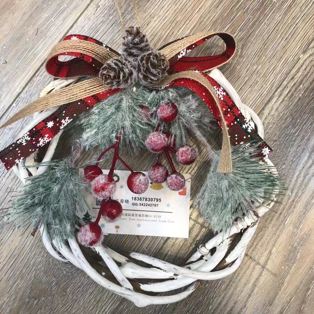 There is a Christmas tree tree hanging Christmas tree circle supplies display