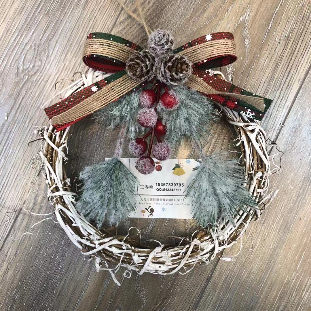 There is a Christmas tree tree hanging Christmas tree circle supplies display
