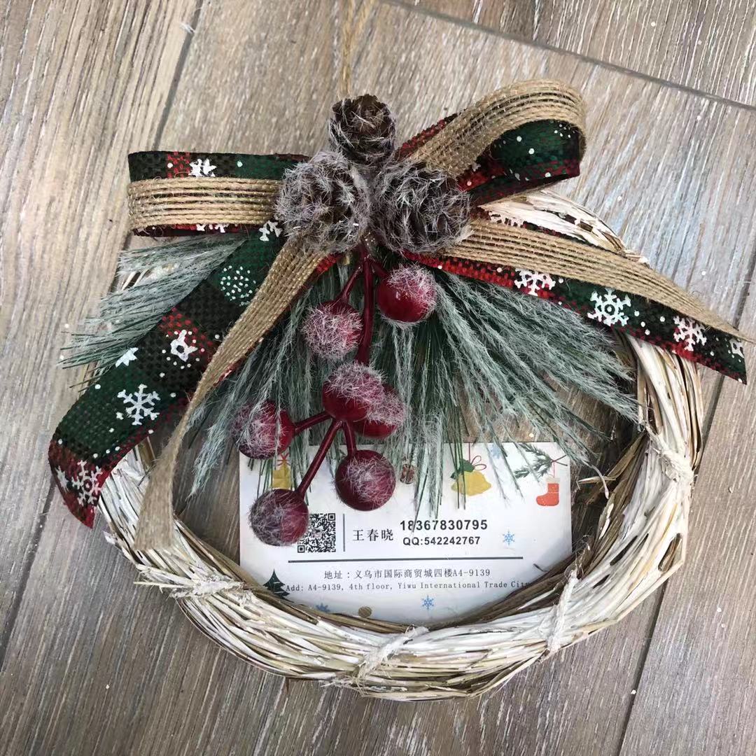There is a Christmas tree tree hanging Christmas tree circle supplies display