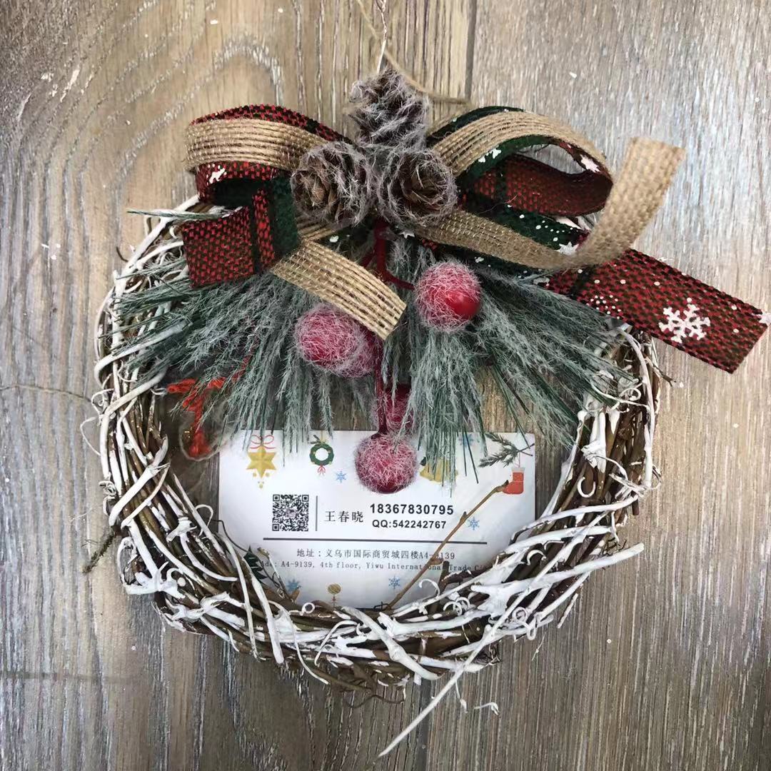 There is a Christmas tree tree hanging Christmas tree circle supplies display