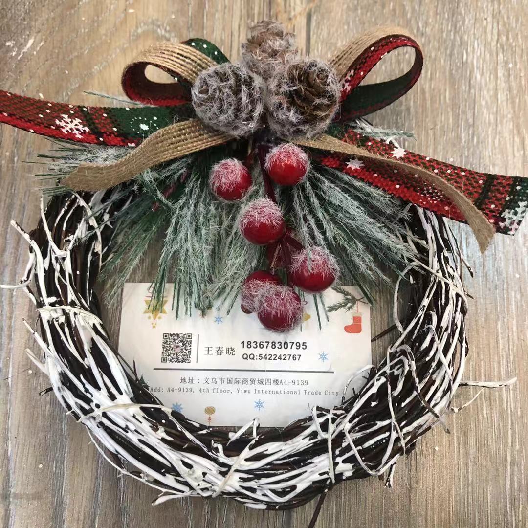 There is a Christmas tree tree hanging Christmas tree circle supplies display