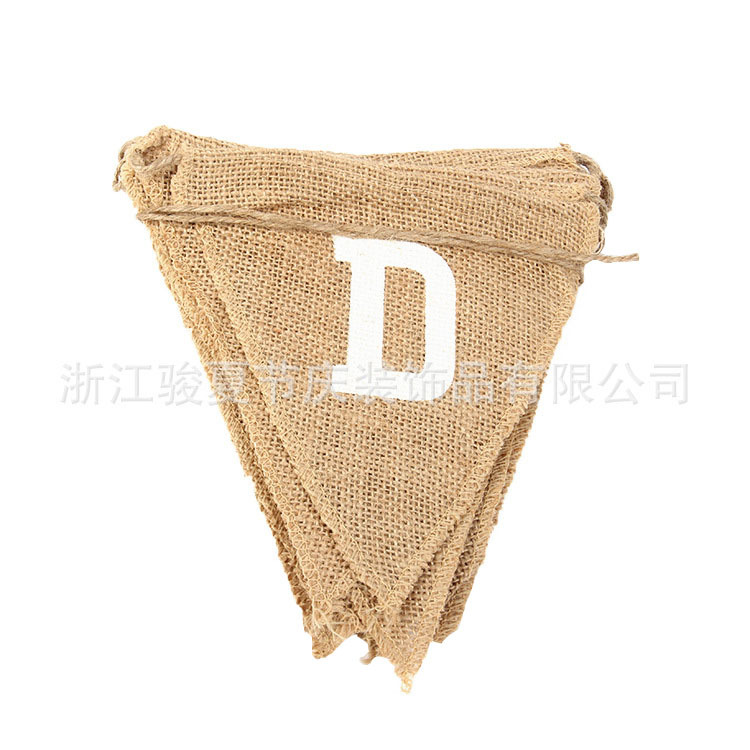 Holiday party decoration: a wedding flag with a linen triangle on the hem