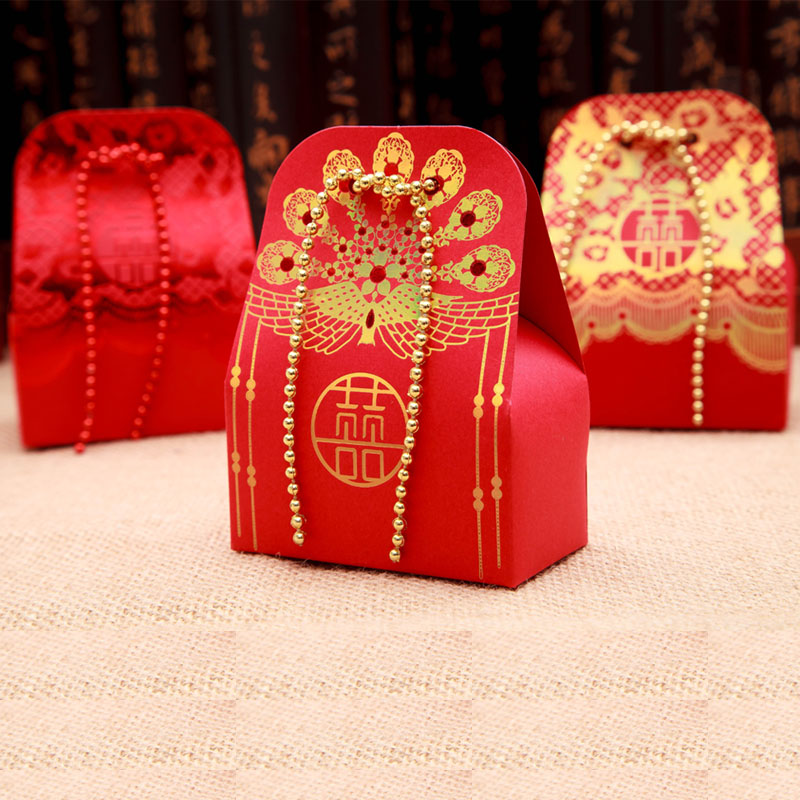 The new \\\&#034;gold bead curtain\\\&#034; creative series large happy candy box wholesale can be customized Chinese style high-grade embossed grain