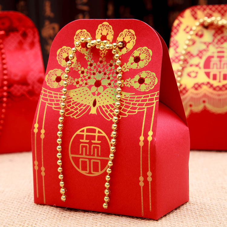 The new \\\"gold bead curtain\\\" creative series large happy candy box wholesale can be customized Chinese style high-grade embossed grain
