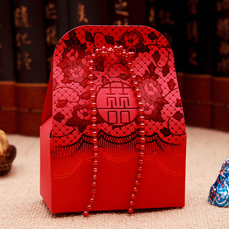 The new \\\"gold bead curtain\\\" creative series large happy candy box wholesale can be customized Chinese style high-grade embossed grain