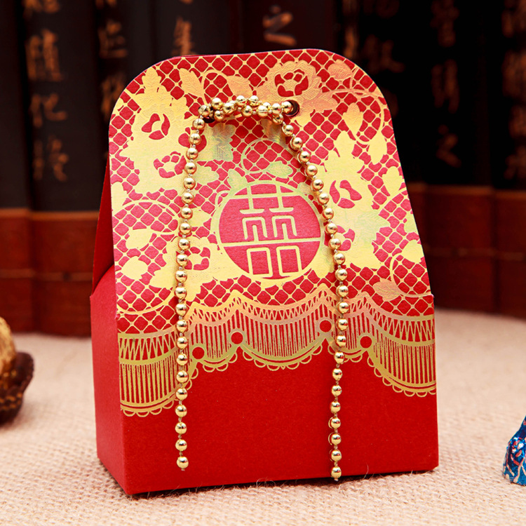 The new \\\"gold bead curtain\\\" creative series large happy candy box wholesale can be customized Chinese style high-grade embossed grain