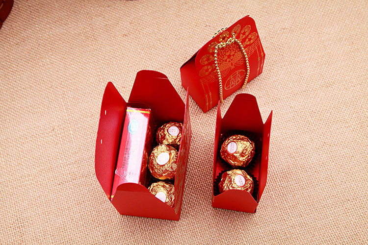 The new \\\"gold bead curtain\\\" creative series large happy candy box wholesale can be customized Chinese style high-grade embossed grain