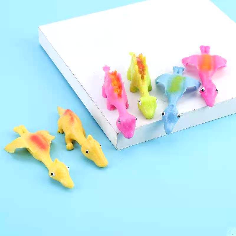 Tiktok Hot Catapult Dinosaur Creative Dinosaur Finger Flipping Decompression Toy TPR Soft Rubber Finger Slingshot Decompression