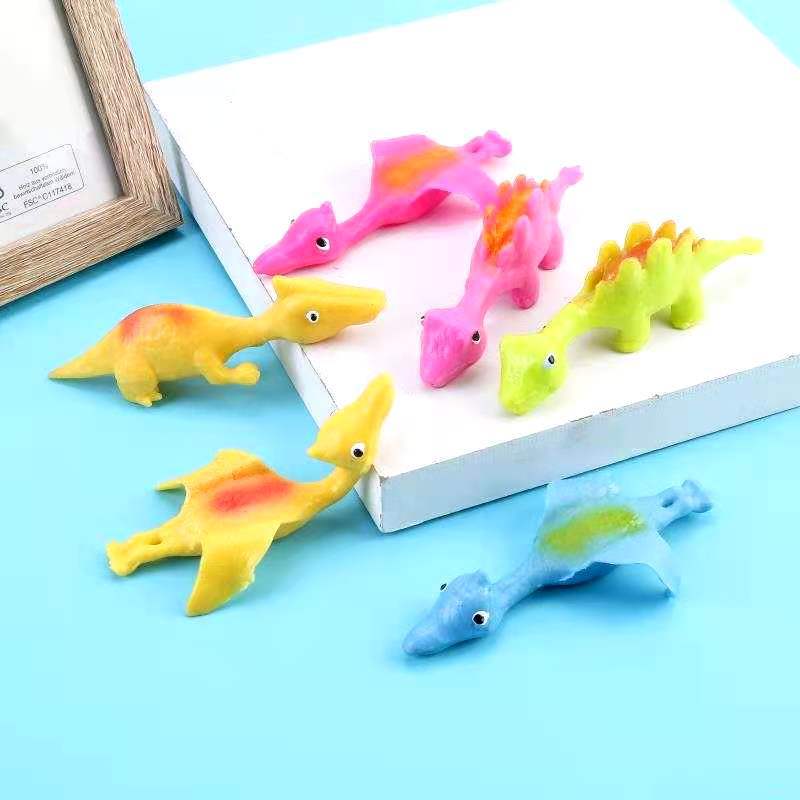 Tiktok Hot Catapult Dinosaur Creative Dinosaur Finger Flipping Decompression Toy TPR Soft Rubber Finger Slingshot Decompression