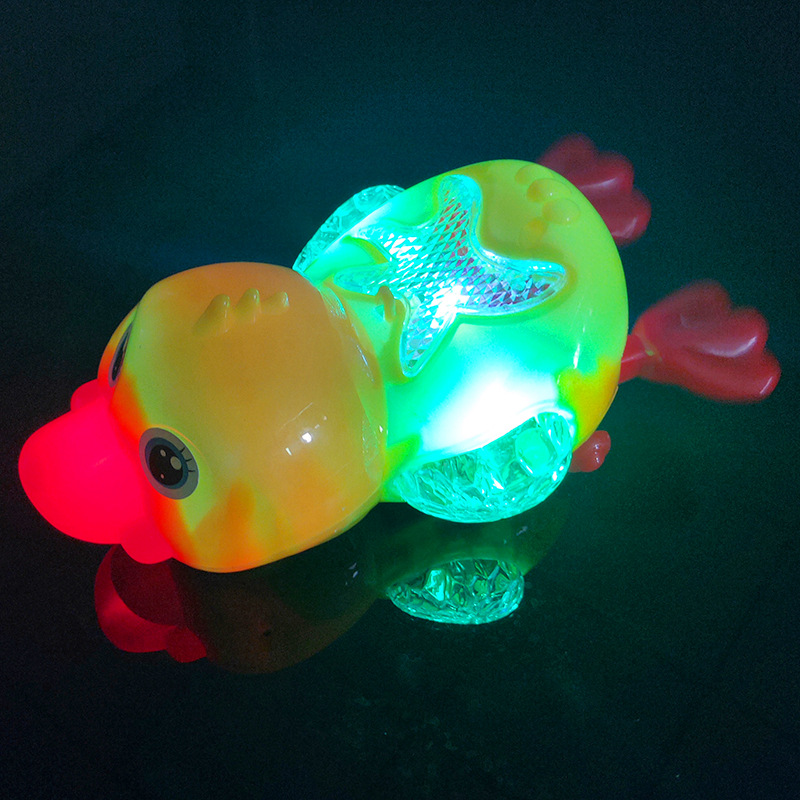 Electric Projection Universal Duck Cartoon Music Swimming Universal Little Duck Hot Selling Stall Toy Supply Wholesale