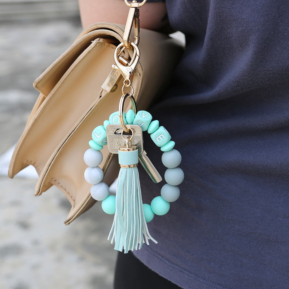 Color Silicone Beads Bracelet Bracelet Keychain Female Foreign Trade Amazon Pu Tassel Card Bag Silicone Bracelet Key Ring Color Silicone Beads Bracelet Bracelet Keychain Female Foreign Trade Amazon Pu Tassel Card Bag Silicone Bracelet Key Ring