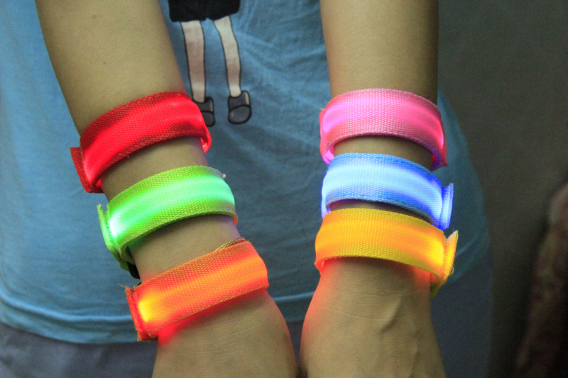 Double exposure buckle wrist band night running biker glowing arm with safety warning entertainment equipment Double exposure buckle wrist band night running biker glowing arm with safety warning entertainment equipment
