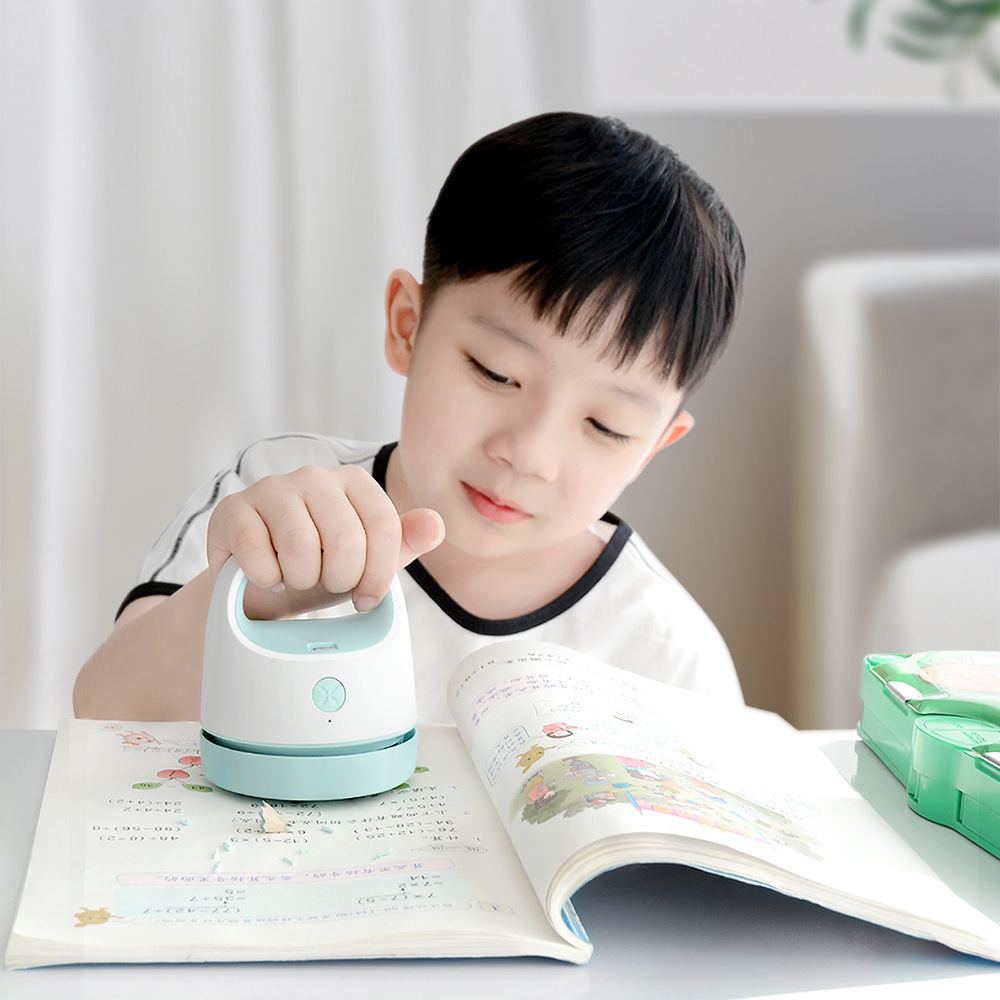 Factory Direct Sales New Desktop Vacuum Cleaner Paper Scraps Dust Pet Hair Dust Brush Student Portable USB Charging