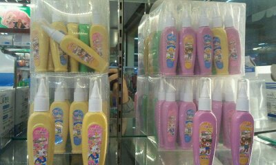 Cartoon modeling correction fluid Cartoon modeling correction fluid