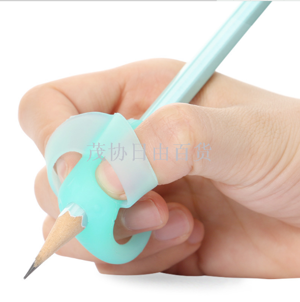 The factory wholesale cat prince silica gel pen holder children primary school pencil set writing posture pen holder orthotic