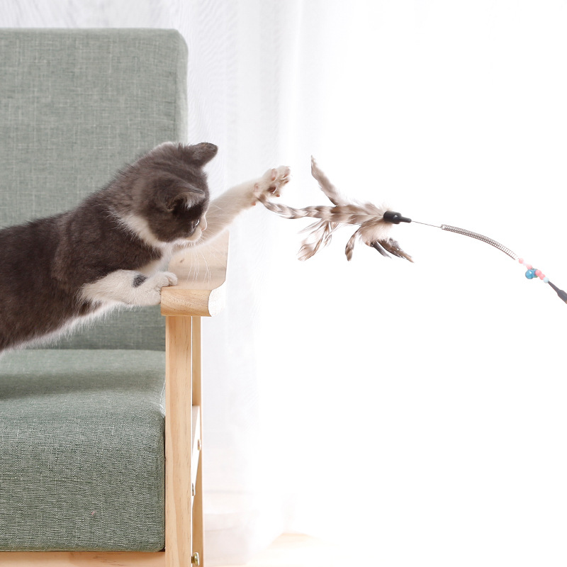 In Stock Wholesale Bags Cat Toy Acrylic Color Stripes Tube + Striped Feather Spring Cat Teaser