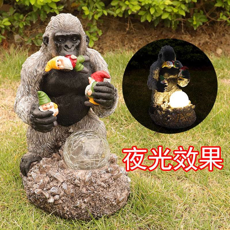 Cross-Border New Garden Decoration Solar Light-Emitting Resin Crafts Orangutan Eating Genie Crystal Ball Decoration Wholesale