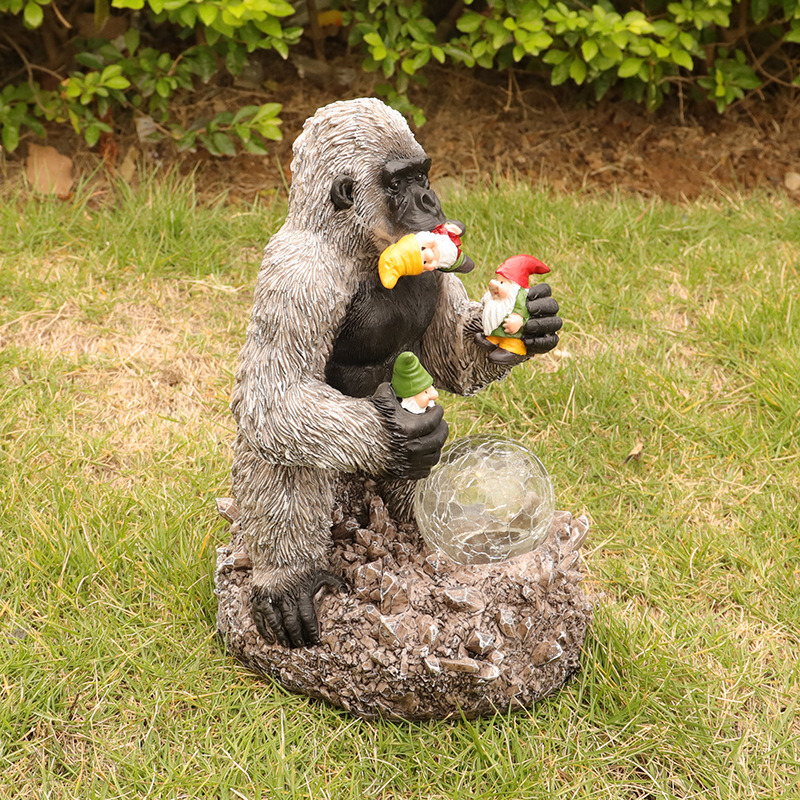 Cross-Border New Garden Decoration Solar Light-Emitting Resin Crafts Orangutan Eating Genie Crystal Ball Decoration Wholesale