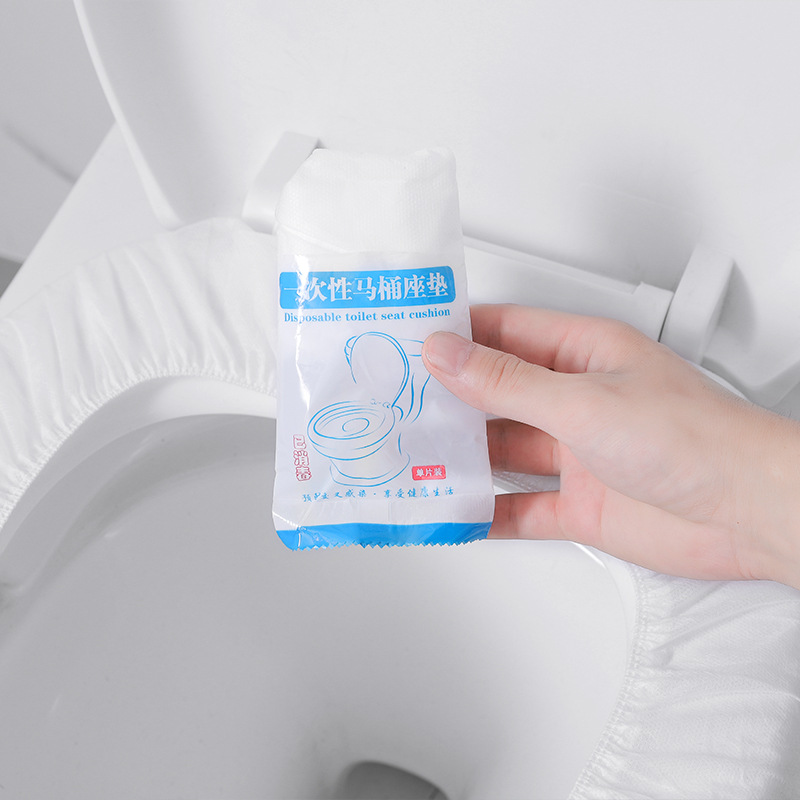 The Disposable Toilet Mat Travel Adhesive Portable Happy Day Cushion Paper Maternal Nonwoven Fabric Waterproof Universal Toilet Seat Cover