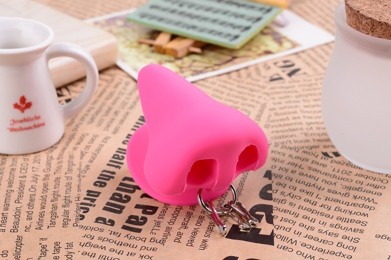 Creative silicone Keychain new mobile phone nose suction cup bracket