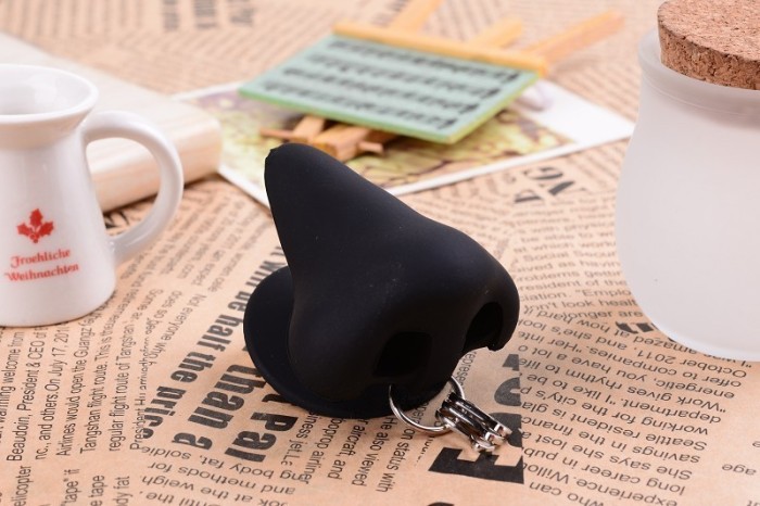 Creative silicone Keychain new mobile phone nose suction cup bracket