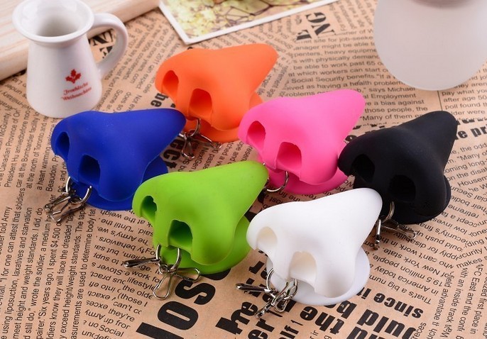 Creative silicone Keychain new mobile phone nose suction cup bracket