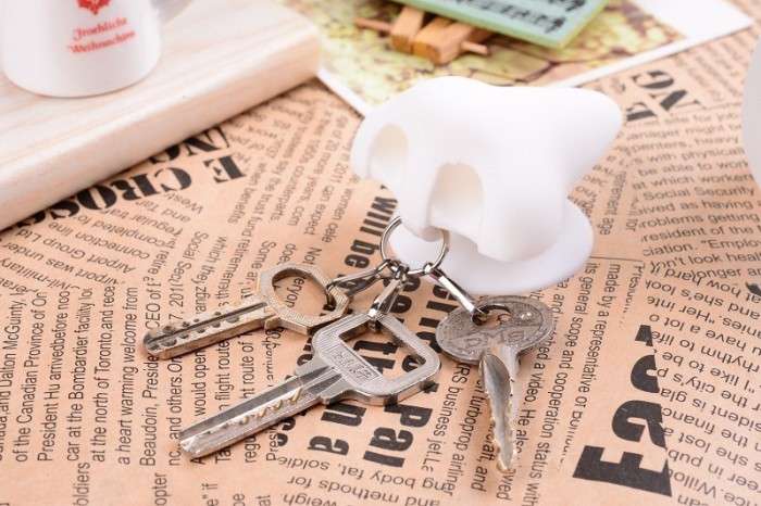 Creative silicone Keychain new mobile phone nose suction cup bracket