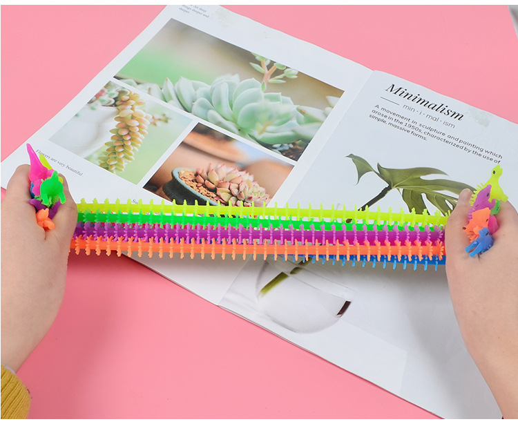 Tiktok Hot Toy TPR Luminous Dinosaur Lala Lecon Yi Bracelet Pull Pull Music Cartoon Vent Pulling Rope Tiktok Hot Toy TPR Luminous Dinosaur Lala Lecon Yi Bracelet Pull Pull Music Cartoon Vent Pulling Rope