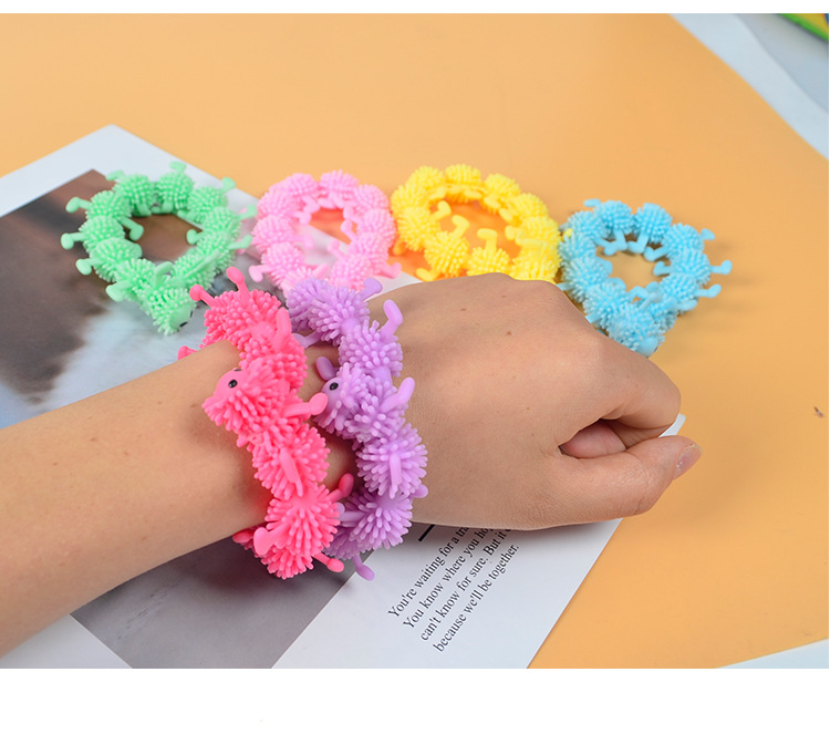 Tiktok Hot Toy TPR Luminous Dinosaur Lala Lecon Yi Bracelet Pull Pull Music Cartoon Vent Pulling Rope Tiktok Hot Toy TPR Luminous Dinosaur Lala Lecon Yi Bracelet Pull Pull Music Cartoon Vent Pulling Rope