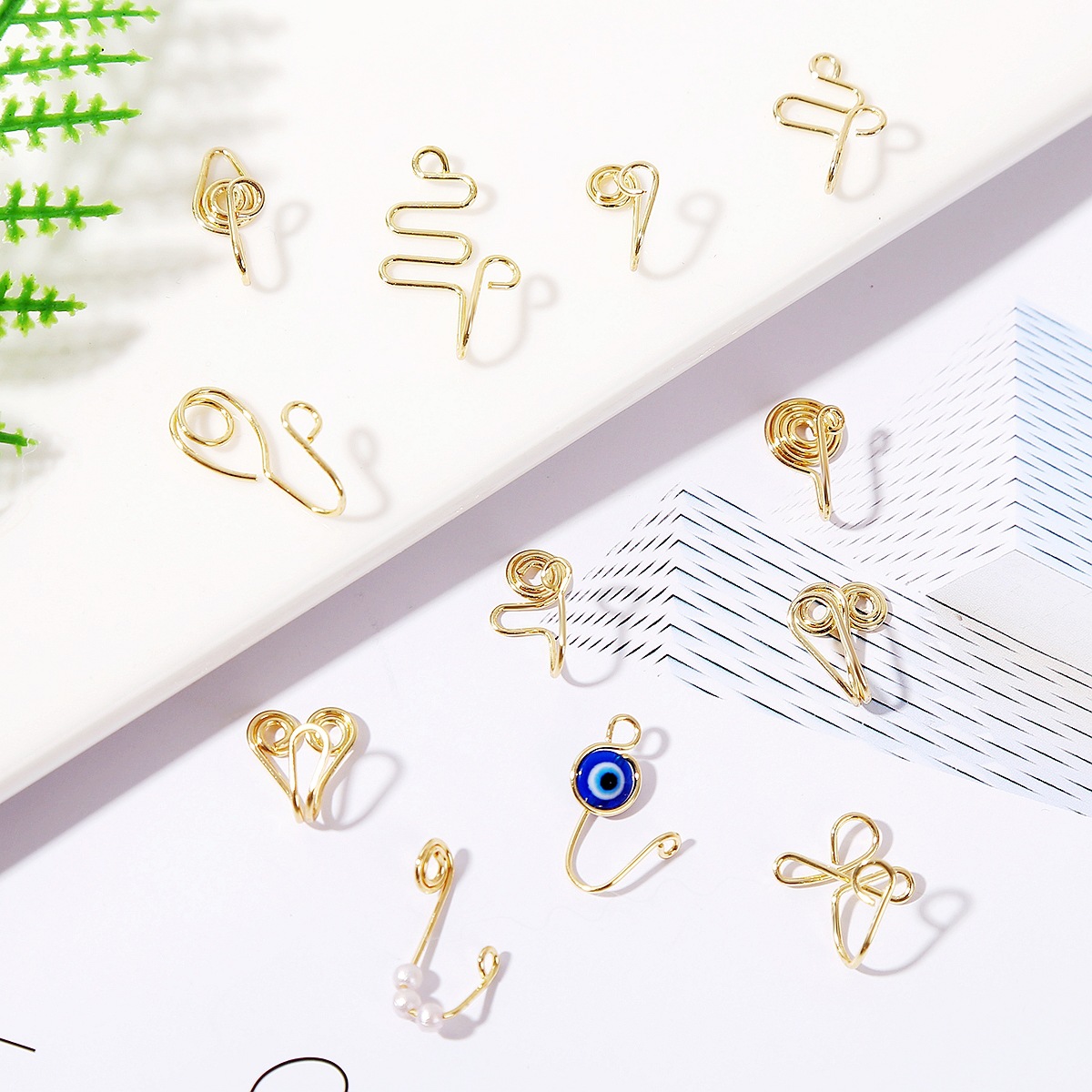 Europe and America Cross Border African Personalized Nose Pad Earless Earrings Women's Retro Handmade Circle Nose Ring Fake Nose Stud 12-Piece Set