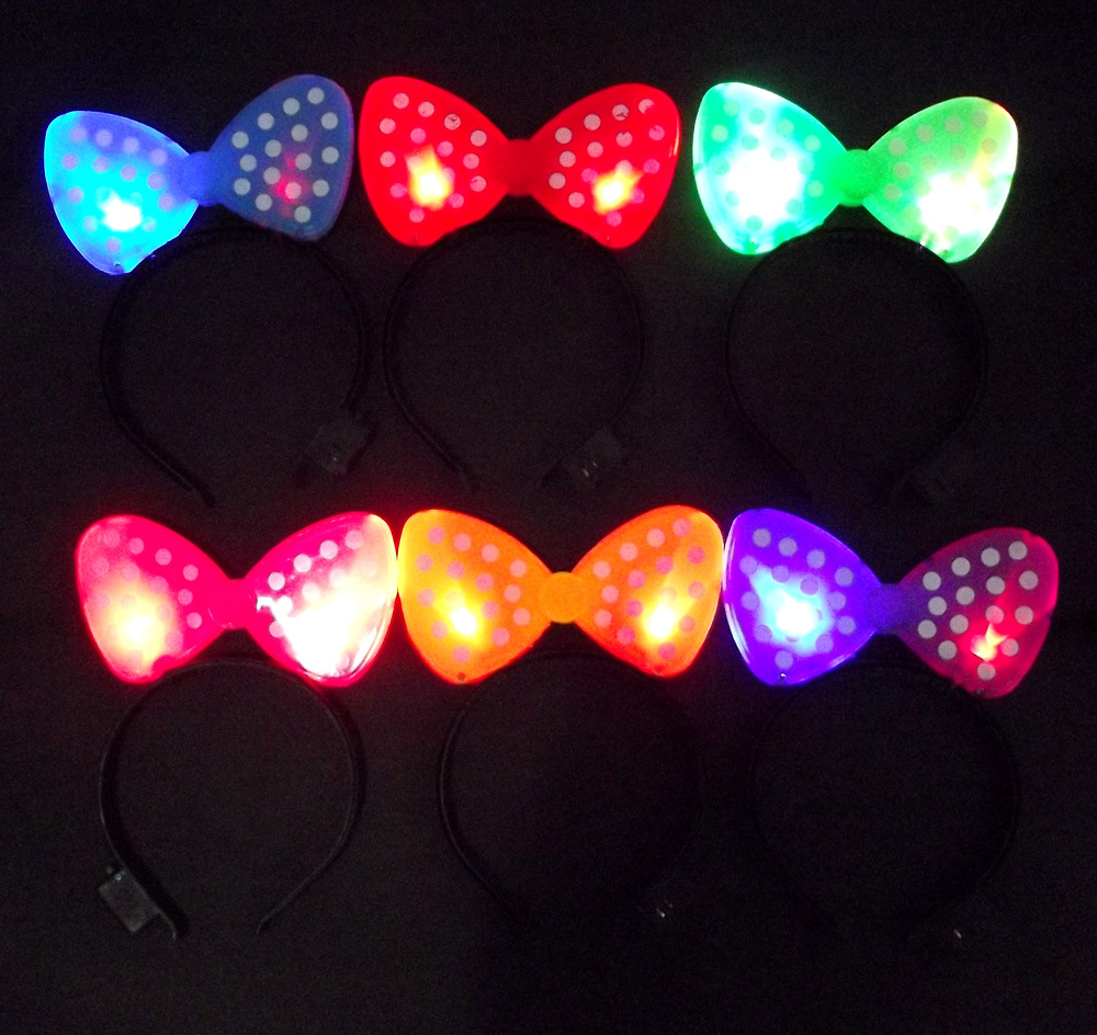 The gala concert party lights flash headdress mikey hair card with a light plastic bow hair card headdress.
