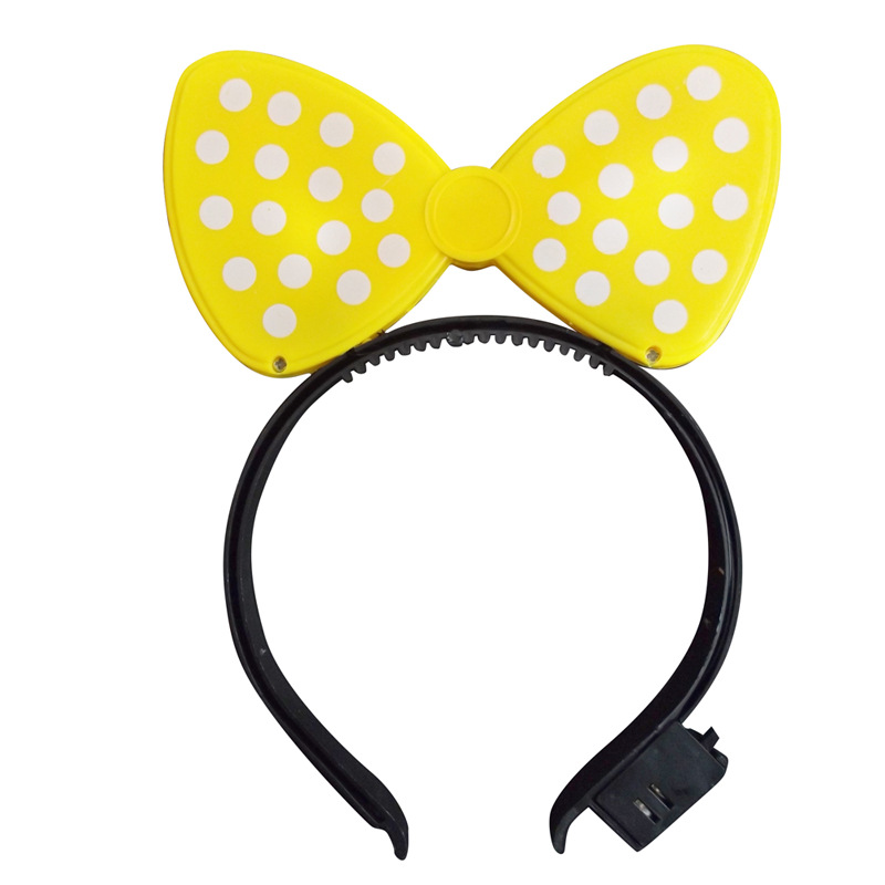 The gala concert party lights flash headdress mikey hair card with a light plastic bow hair card headdress.