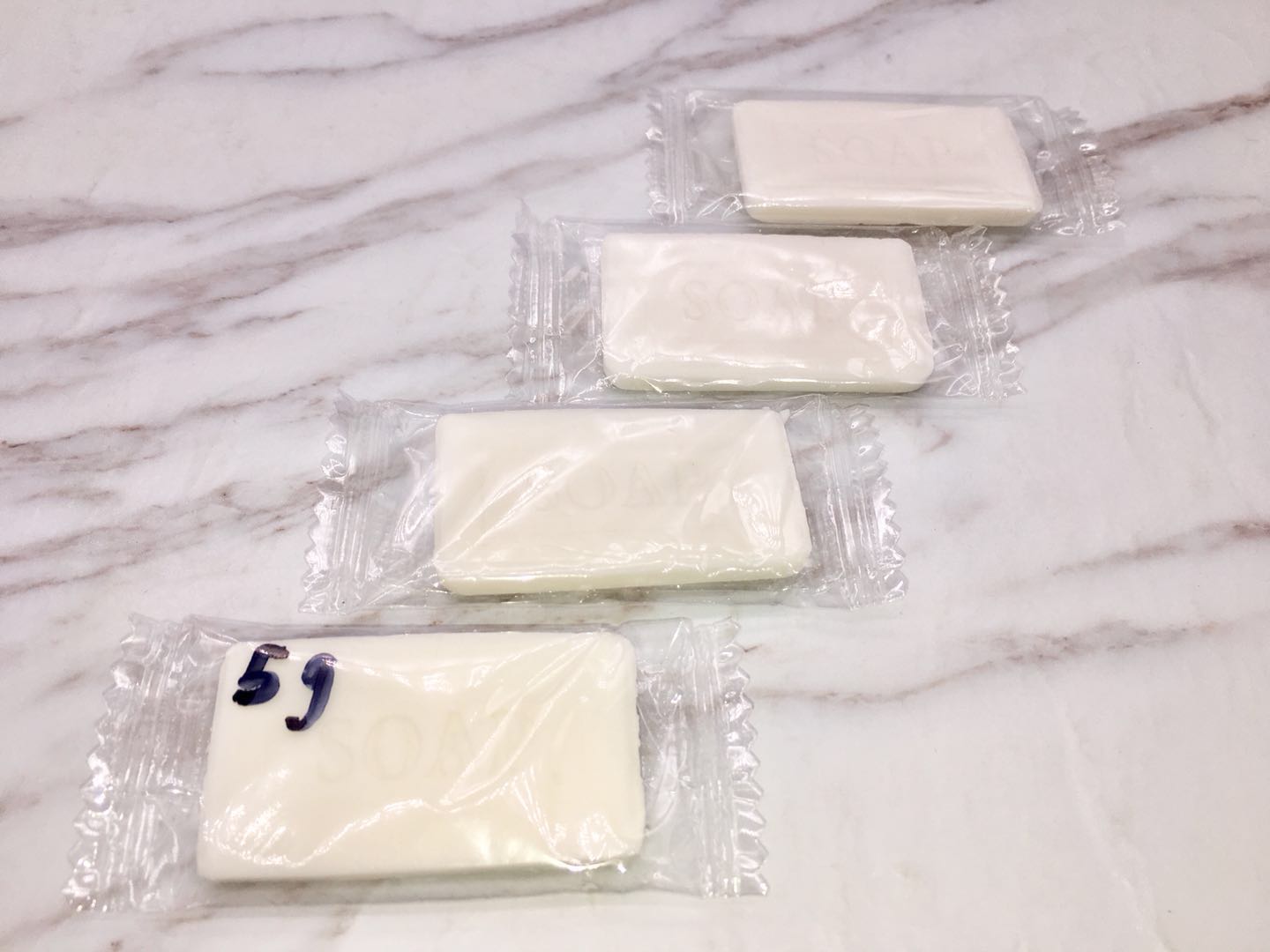 Disposable soap provided by guest room.