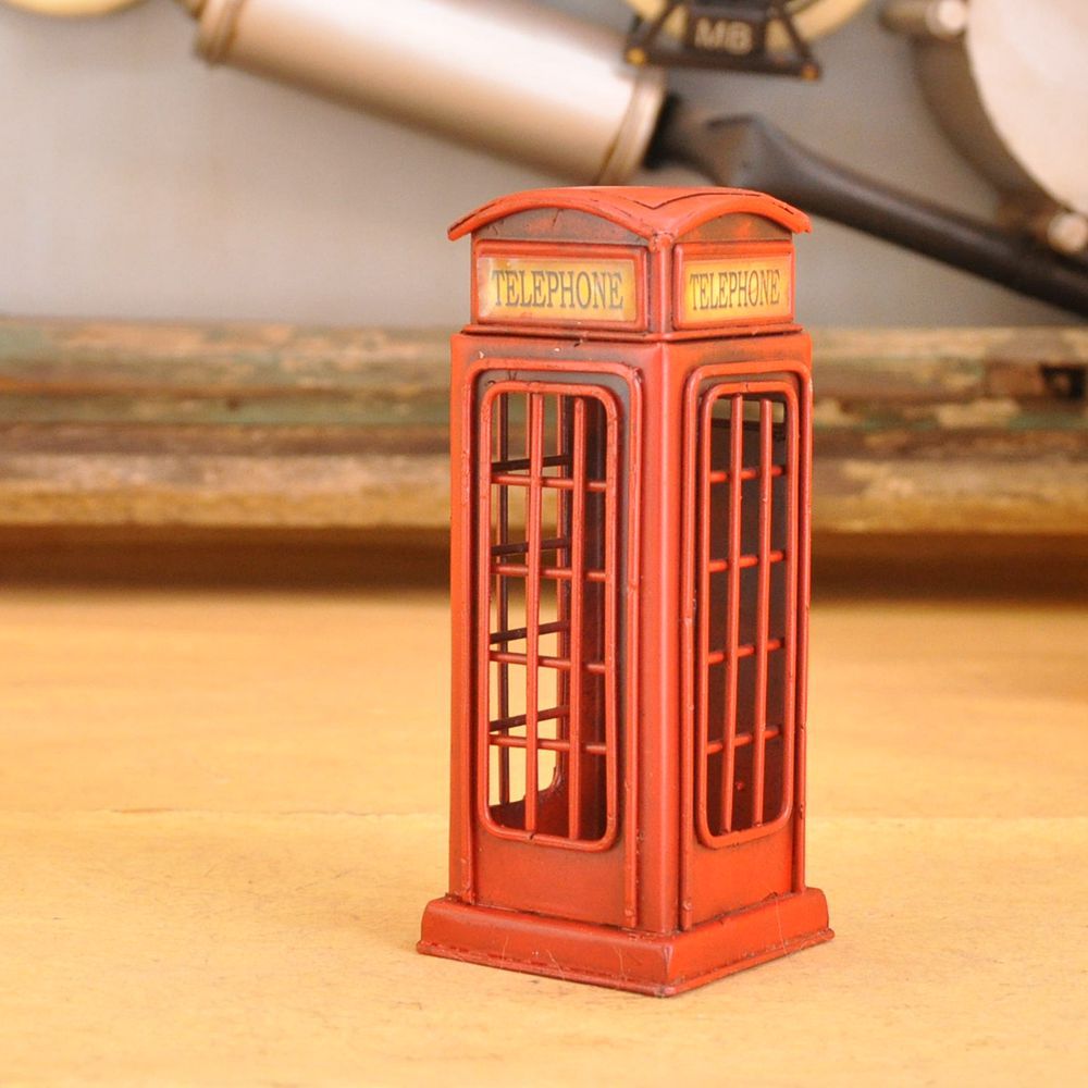Mini telephone kiosk save money can simple European style small furnishing furniture shop window display. Mini telephone kiosk save money can simple European style small furnishing furniture shop window display.