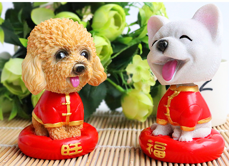 Shake head to simulate a dog car to set up a fortune car to shake a dog. Shake head to simulate a dog car to set up a fortune car to shake a dog.