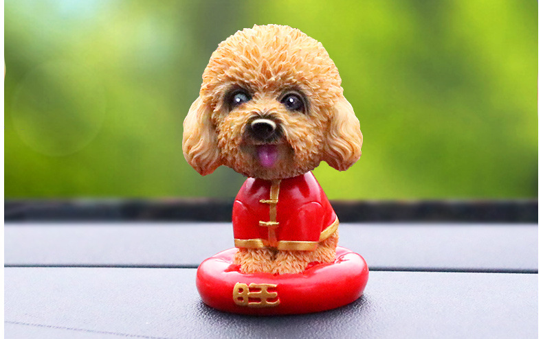Shake head to simulate a dog car to set up a fortune car to shake a dog. Shake head to simulate a dog car to set up a fortune car to shake a dog.