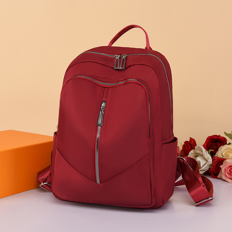 Foreign Trade Wholesale New Fashion Oxford Cloth Backpack Lightweight Travel Backpack Storage Bag Student Schoolbag Fashion Delivery