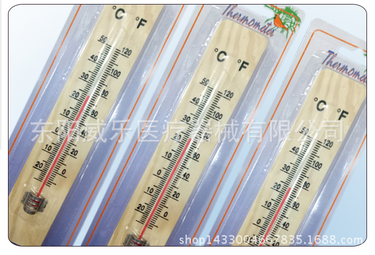 Small wooden thermometer with large thermometer 