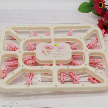 Baby clothes rack children&#039;s underwear multi-function plastic clip hook circular household windproof clothes rack