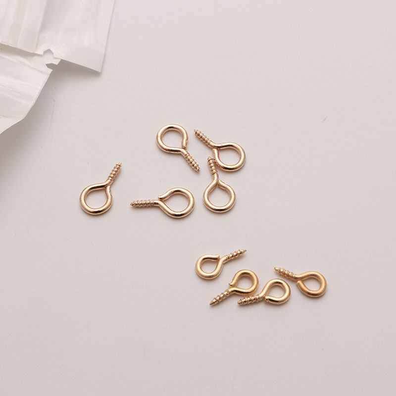 The factory supplies various specifications Sheep Eye Nails gold iron sheep eye ring screw hook lobster toy doll Accessories