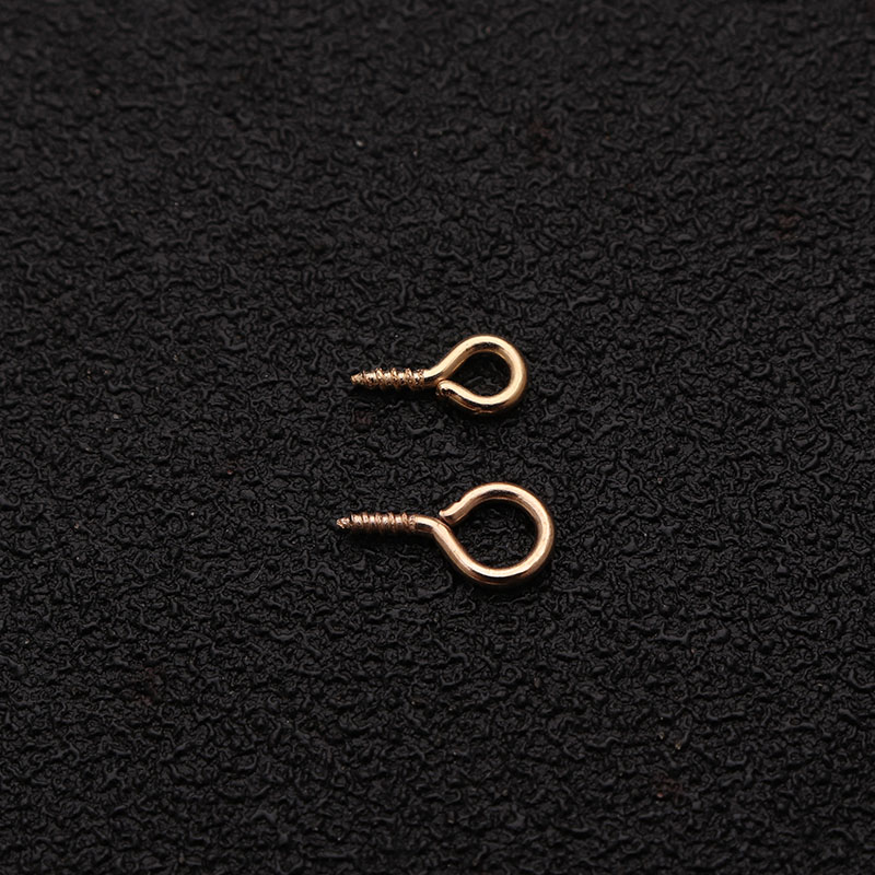 The factory supplies various specifications Sheep Eye Nails gold iron sheep eye ring screw hook lobster toy doll Accessories