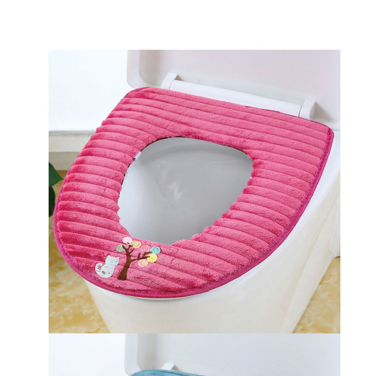 The toilet seat is sitting on the toilet seat, the toilet seat cushion the toilet seat. The toilet seat is sitting on the toilet seat, the toilet seat cushion the toilet seat.