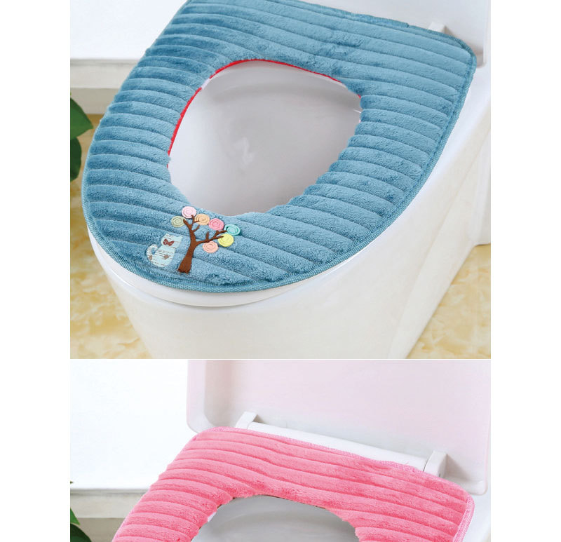The toilet seat is sitting on the toilet seat, the toilet seat cushion the toilet seat. The toilet seat is sitting on the toilet seat, the toilet seat cushion the toilet seat.