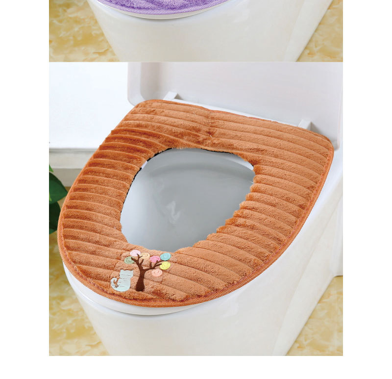 The toilet seat is sitting on the toilet seat, the toilet seat cushion the toilet seat. The toilet seat is sitting on the toilet seat, the toilet seat cushion the toilet seat.